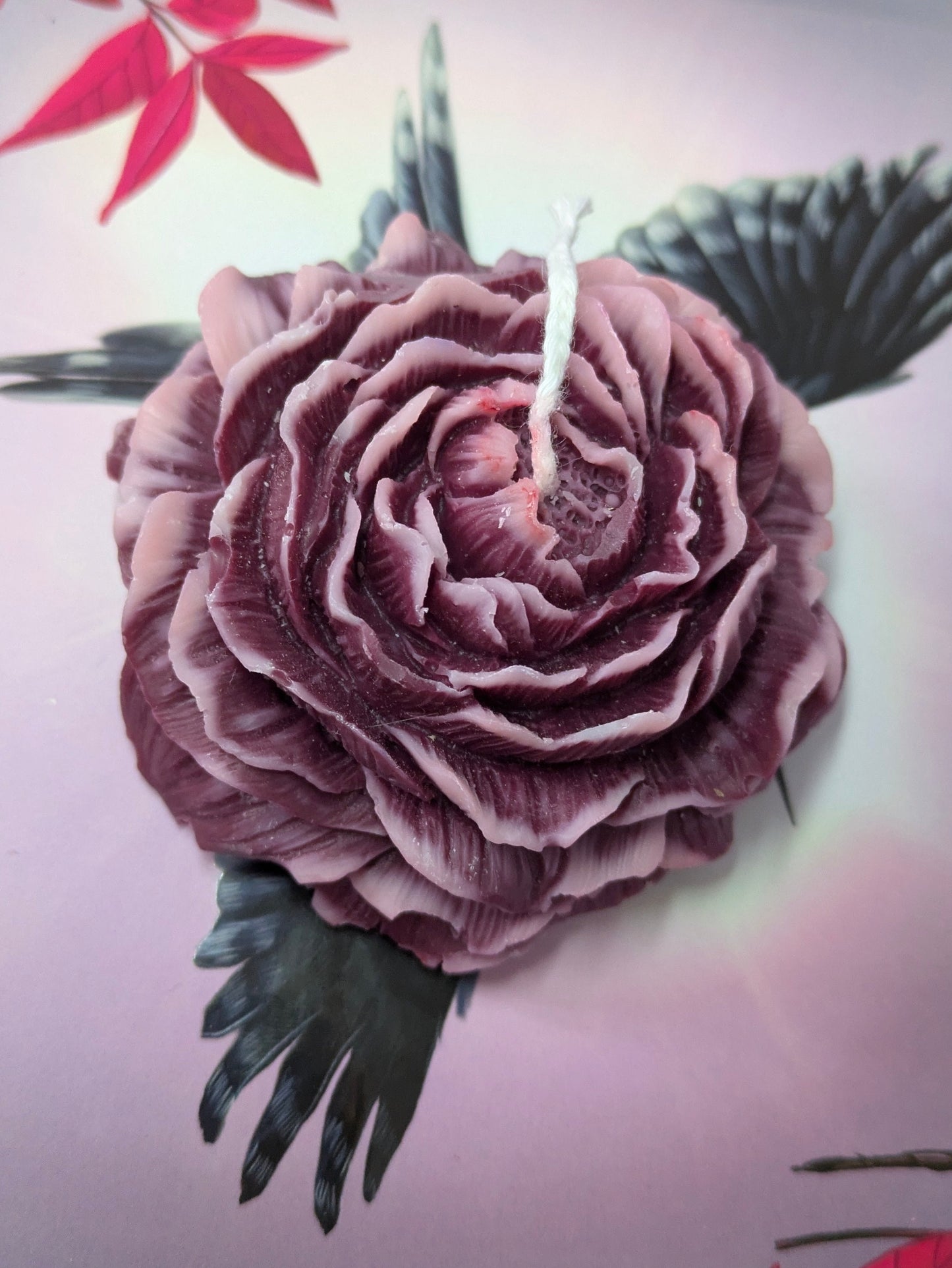 Purple Peony Rose candle by VitaUnlimited, featuring a decorative candle with a purple and rose floral design.