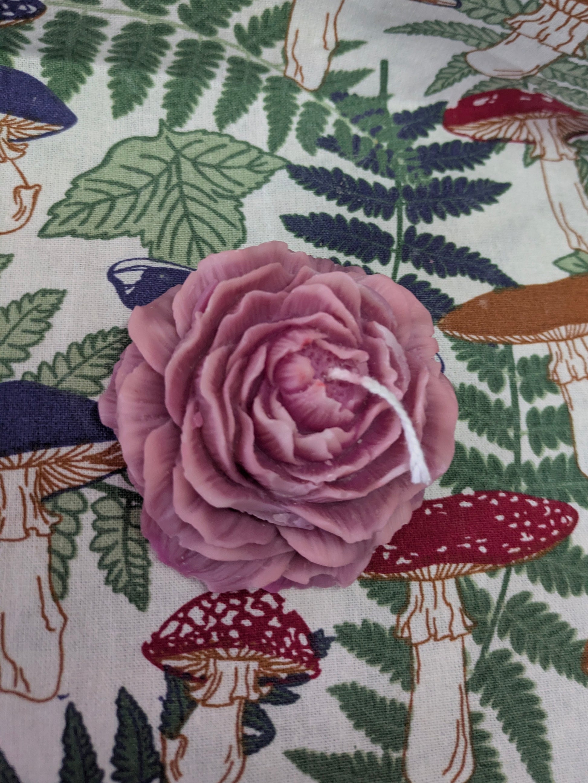 Pink Peony Rose Candle by VitaUnlimited with a soft pink wax and floral peony rose design.